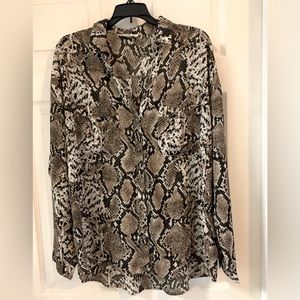 Snakeskin printed long sleeve shirt.